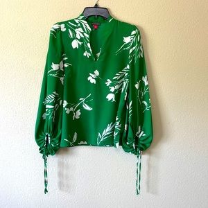 Stunning green blouse with white floral detail